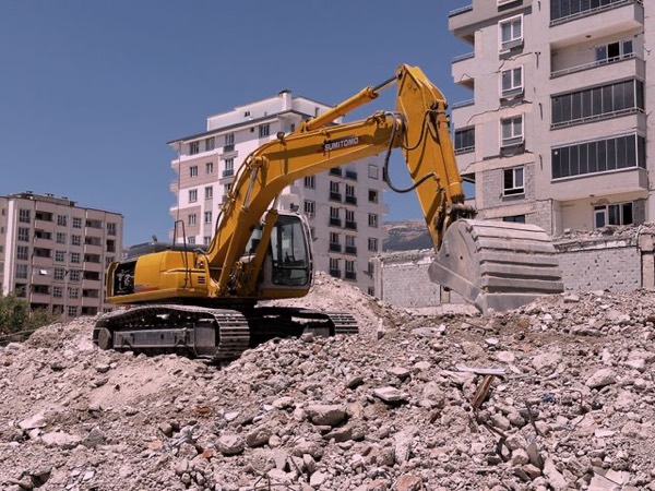 Demolition crew tearing out an interior